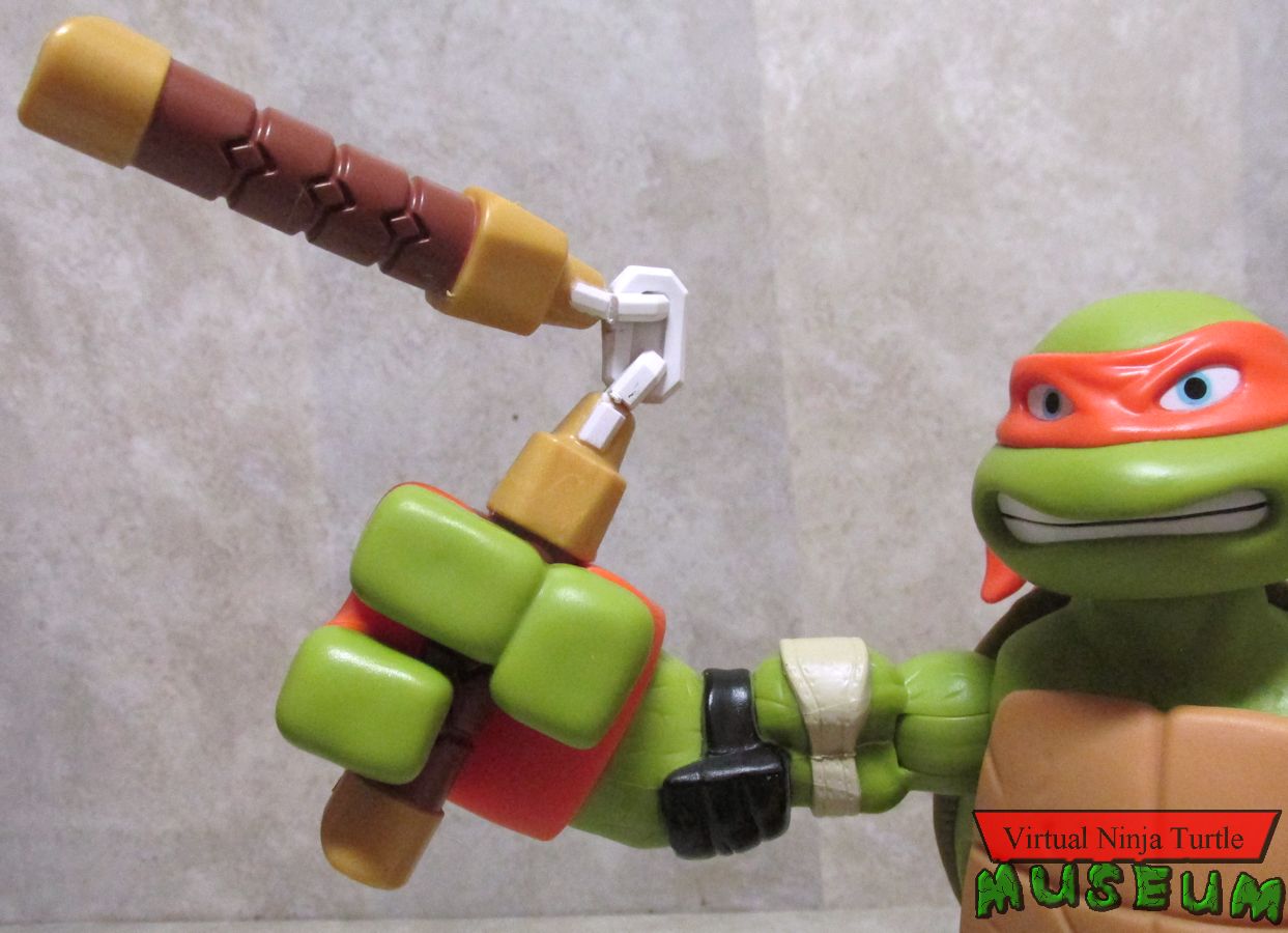 Roll-N-Punch Michelangelo's nunchuk